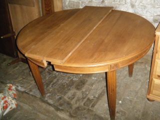 Table ovale à rallonge centrale